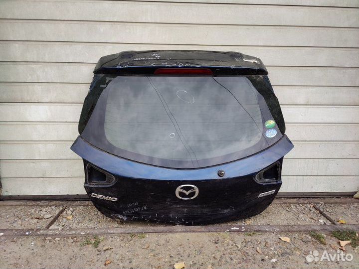Крышка багажника Mazda Demio 4