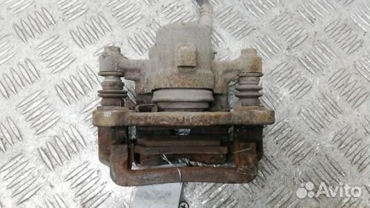 Суппорт тормозной задний правый toyota corolla E12