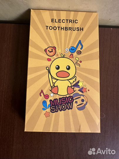 Электрическая зубная щетка