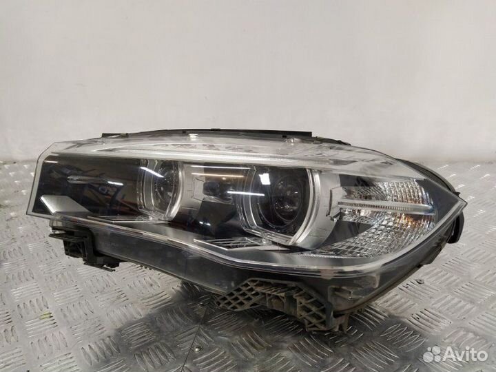 Фара биксеноновая левая Bmw X5 3.0D