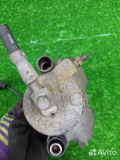 Суппорт тормозной передний левый Volkswagen Jetta