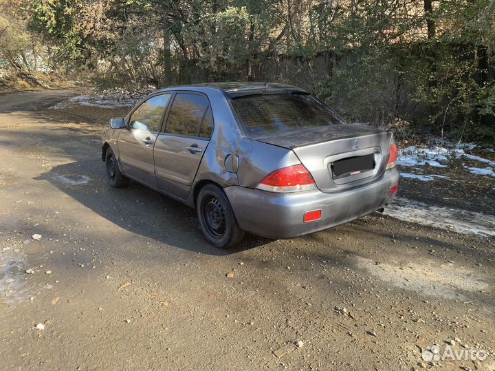 Mitsubishi Lancer 1.6 МТ, 2009, битый, 195 000 км