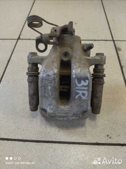 Суппорт тормозной задний правый Peugeot 407