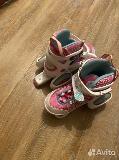 Роликовые коньки