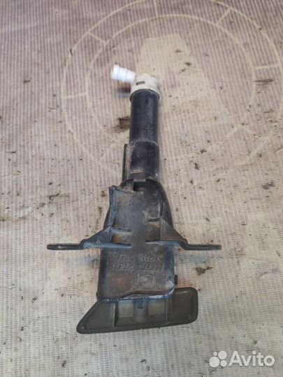 Форсунка омывателя фар левая Mitsubishi Outlander