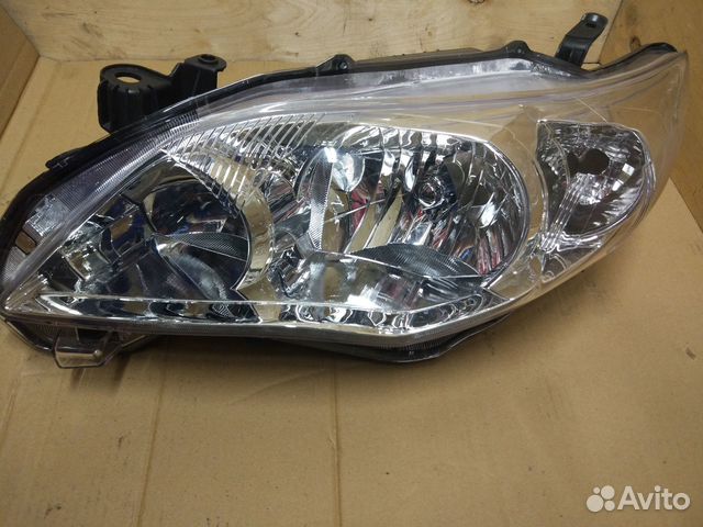 Фара левая Toyota Corolla 140 150 2010 - 2012