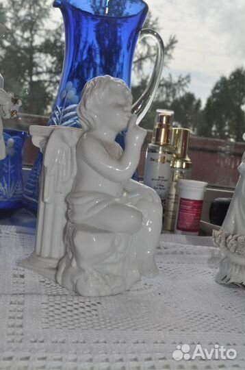 Фарфоровая статуэтка ангел- подсвечник