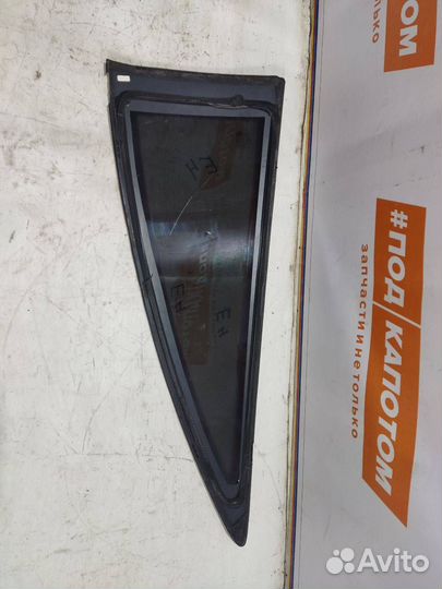 Стекло кузовное заднее левое Opel Astra