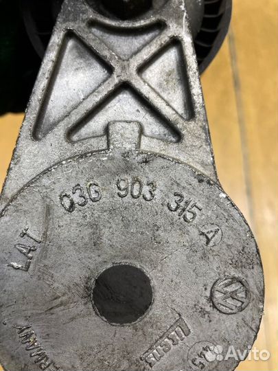 Натяжной ролик приводного ремня Volkswagen Golf 5