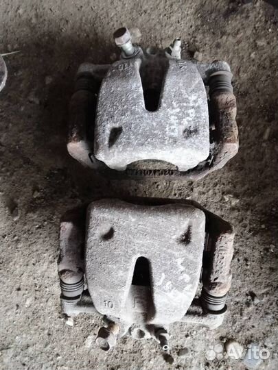 Суппорт тормозной задний Toyota Corolla Verso