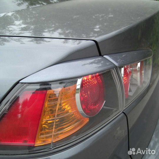 Накладки на задние фонари Митцубиси Лансер 10