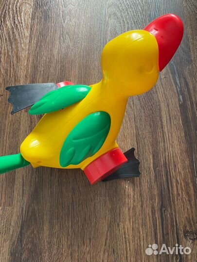 Игрушка каталка с ручкой