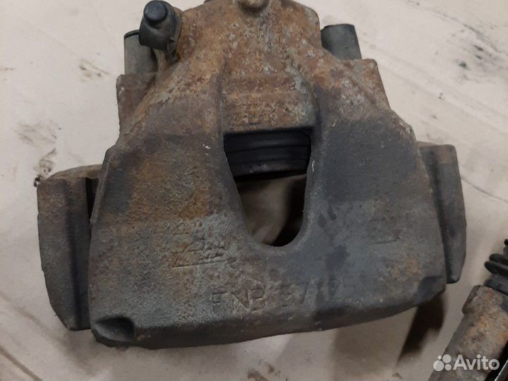 Суппорт тормозной Opel Astra H G Zafira A B