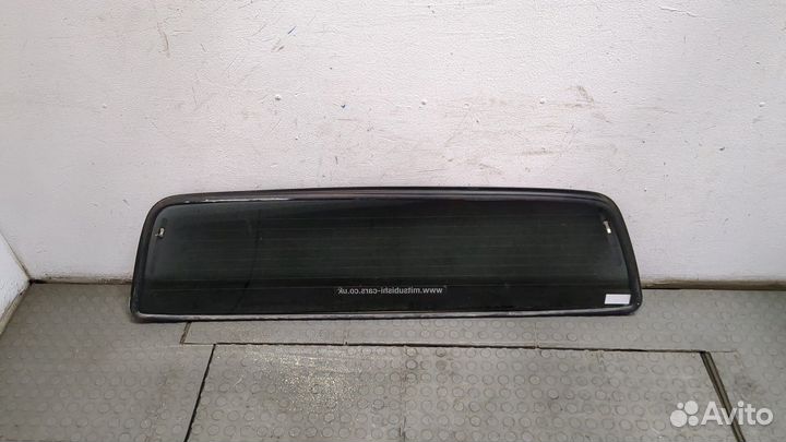 Стекло заднее Mitsubishi L200, 2005