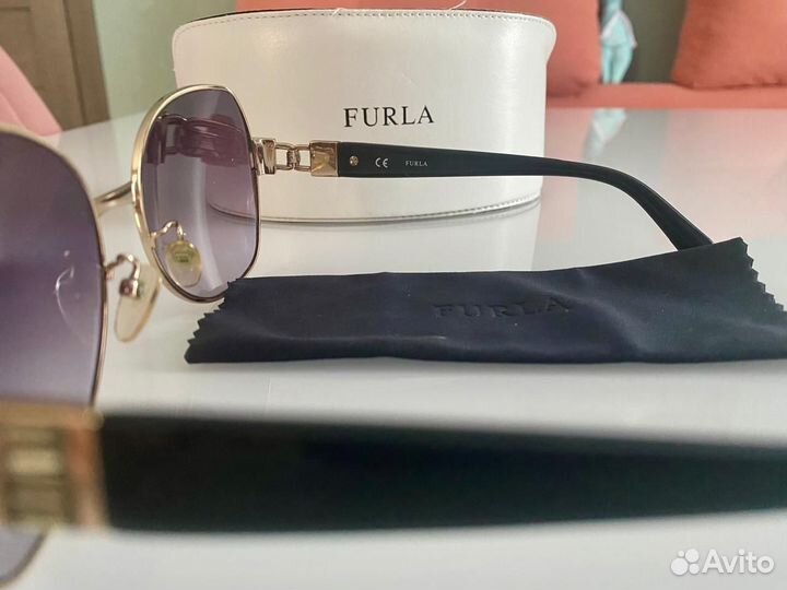 Солнцезащитные очки женские брендовые