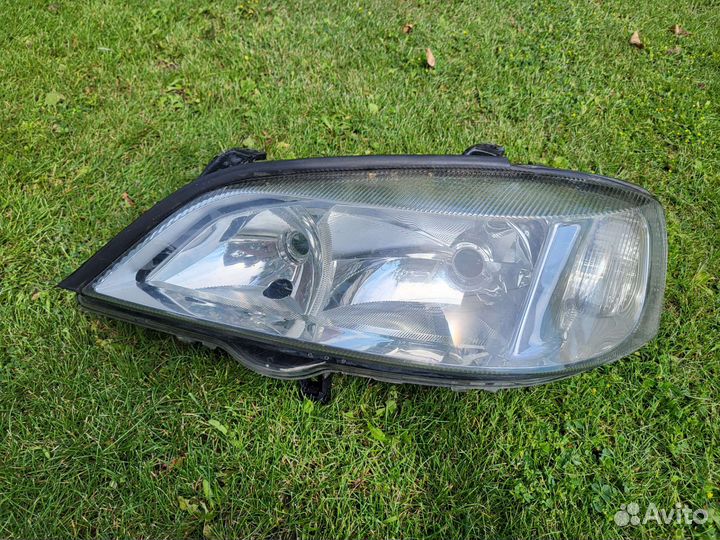 Фара левая opel astra j