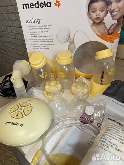 Молокоотсос medela swing электрический