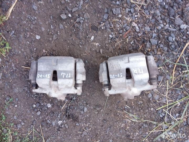 Суппорт тормозной Toyota Camry (Xv70) передний пр