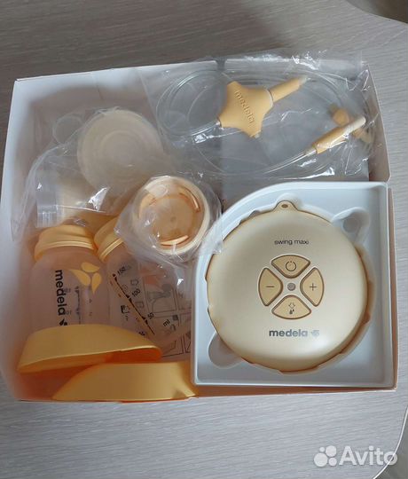 Молокоотсос Medela Swing Maxi + смартсоска Calma