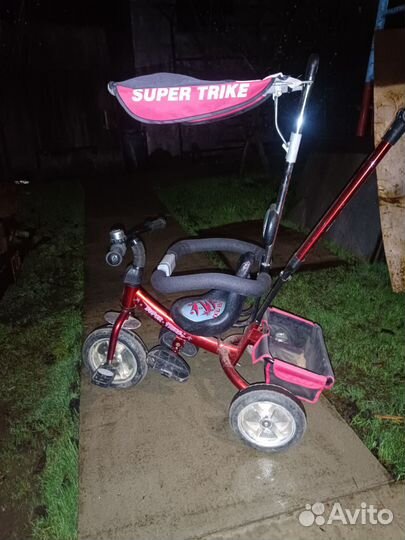 Детский трехколесный велосипед с ручкой