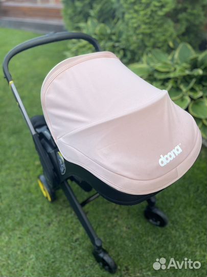 Коляска автокресло doona с базой isofix