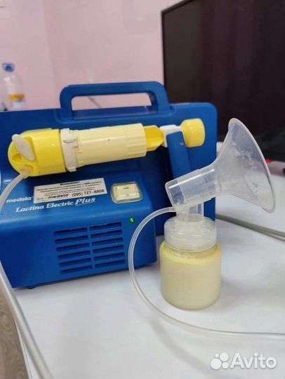 Молокоотсос medela электрический