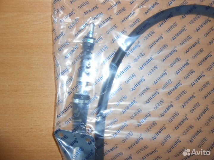 Трос ручника правый Киа Спортаж 3 (2WD)