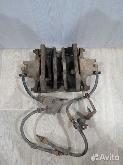 Суппорт передний левый Mitsubishi Lancer 10