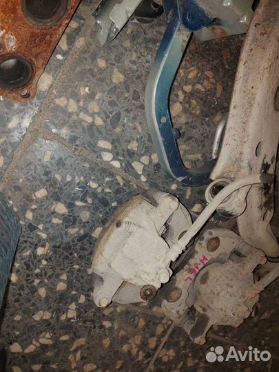 Суппорт nissan almera N16 правый, левый