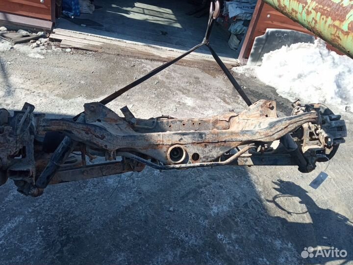 Балка подвески DNT31-210990 на Nissan X-Trail DNT3