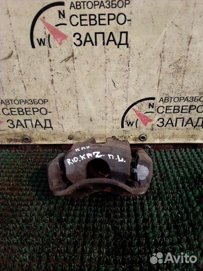 Суппорт передний левый Kia Rio