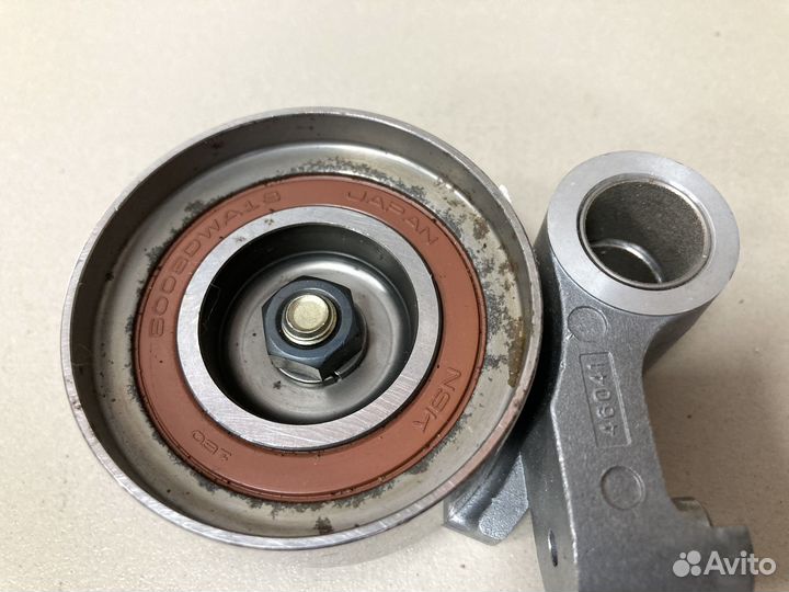 Ролик натяжителя ремня грм Toyota 1350546041 / 031