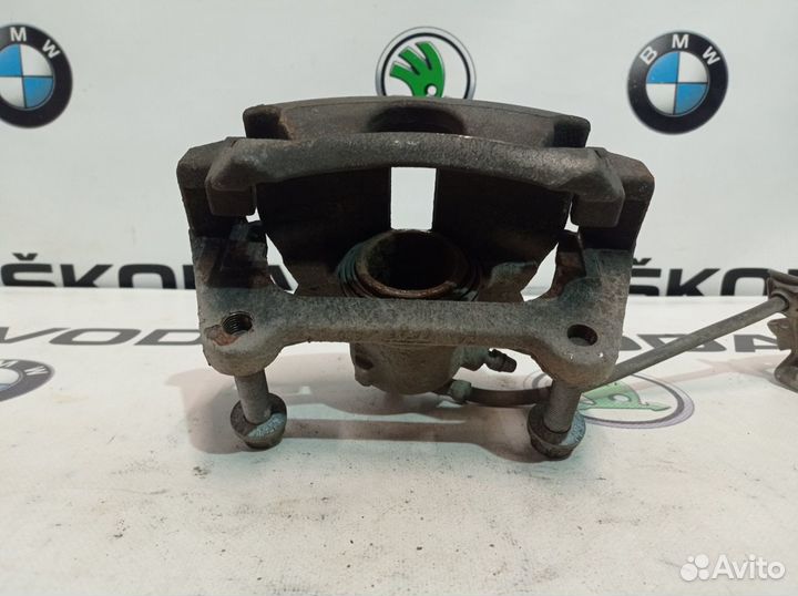 Суппорт тормозной передний левый Skoda Octavia A7