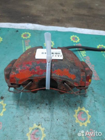 Суппорт передний левый Ford Focus 2 седан 1.8