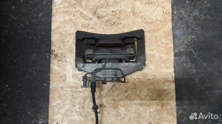 Суппорт тормозной передний левый Audi Alroad A6 C6