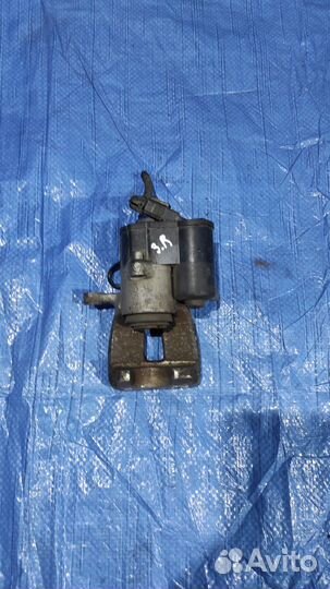 Суппорт тормозной задний правый Volkswagen Passat