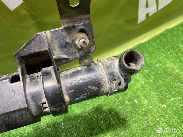 Форсунка омывателя фар левая Nissan Teana J31