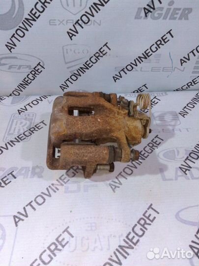 Суппорт тормозной задний левый Hyundai Solaris 1