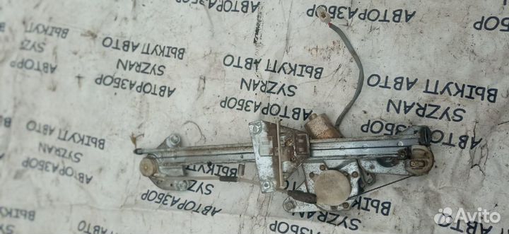 Стеклоподъемник Mazda Capella левый задний