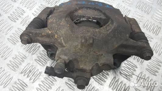 Суппорт тормозной передний левый opel astra J (TBN