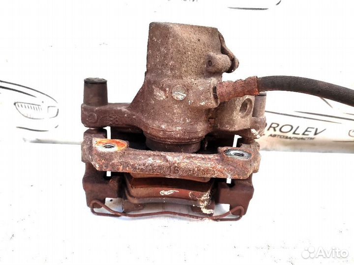 Суппорт задний левый (2002-2009) Mazda Mazda 3