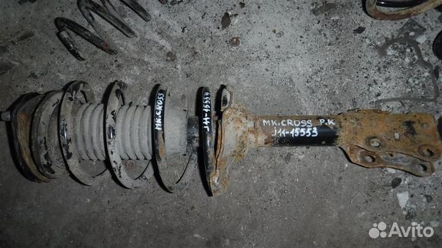 Амортизатор передний левый Geely MK Cross 2011