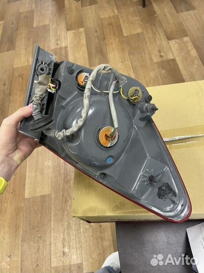 Фонарь задний внешний левый Chevrolet Cruze