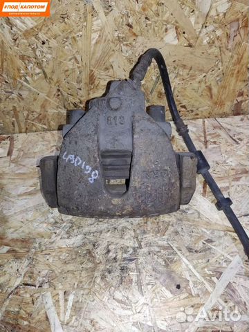 Суппорт тормозной передний левый Mazda 3 BL