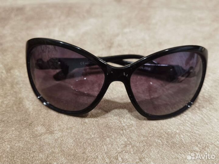 Солнечные очки женские