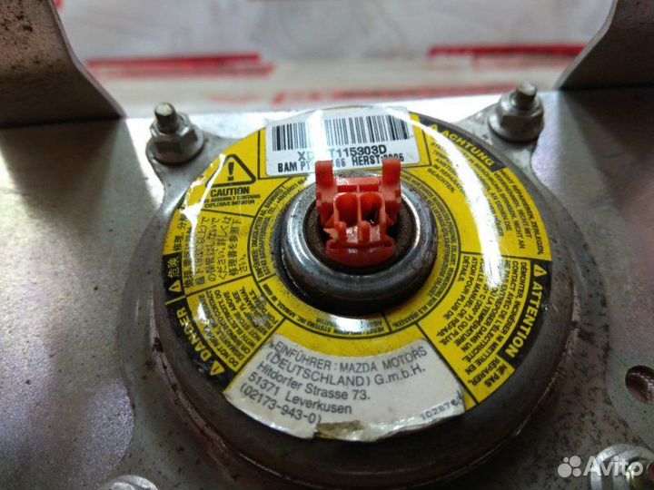 Подушка безопасности пассажирская в торпедо Mazda