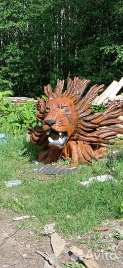 Лев из цельного корня дерева