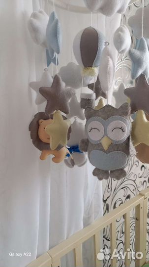 Музыкальный мобиль на кроватку