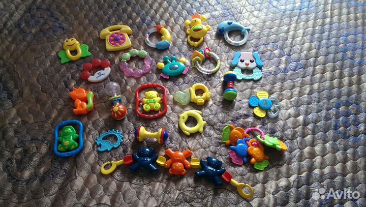 Пакет погремушек, прорезывателей