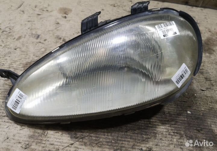 Фара mazda eunos presso